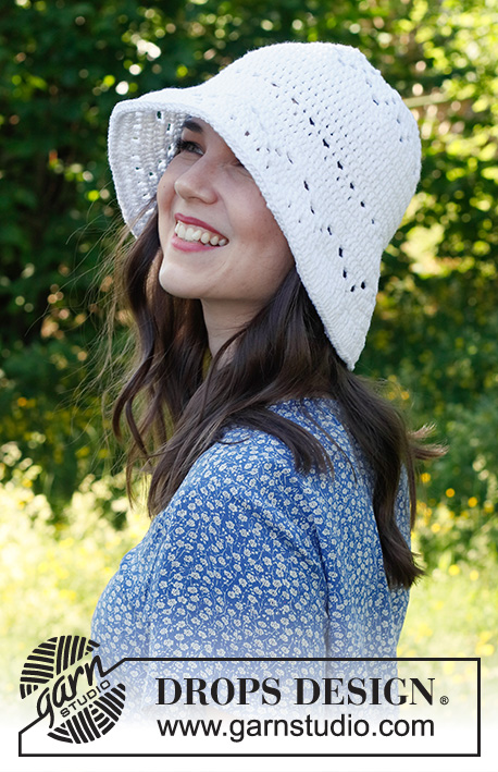 A woman wearing the Breezy Belle Crochet Hat