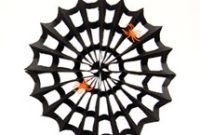 Make DIY Paper Spiderweb Decorations for Halloween