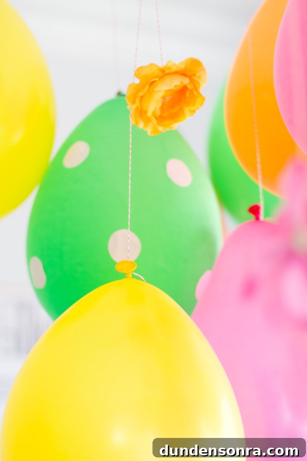 Madeline’s Colorful DIY Flower-Filled Birthday Party Ideas 5 Balloon Ceiling DIY