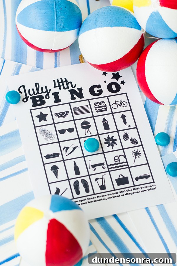 Free Printable July 4th Bingo PDF Free Printable July 4th Bingo page on a blue painted background with blue candies and beach balls.