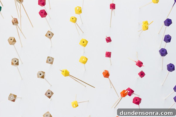 Geometric Party DIYs: 12 Creative Decorations and Crafts 18 DIY Colorful Wooden Geometric Beads