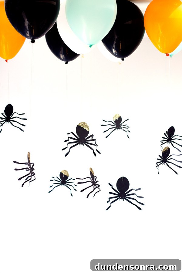 DIY Hanging Spider Balloons: Halloween Decoration Tutorial 9 DIY Hanging Spider Balloons4