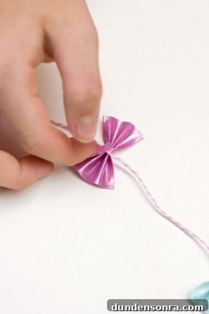 DIY Tiny Duct Tape Bow Garland for Gift Wrapping and Decor 12 DIY Duct Tape Bow Gift Garland Step 8