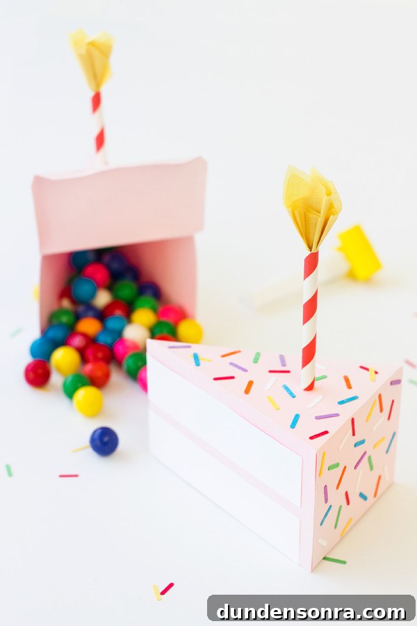 A paper birthday cake and gum balls 
