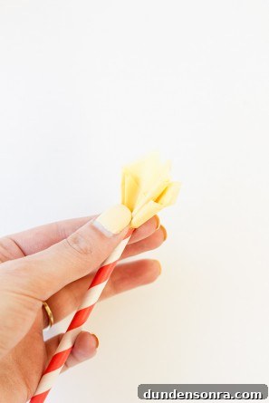 Someone holding yellow paper