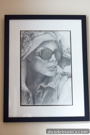 A drawing of a woman with glasses and a hat