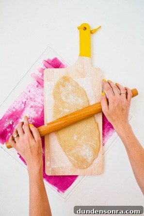 Vanilla Cardamom Pear Hand Pies — Homemade Mini Dessert Pies 6 Someone rolling dough