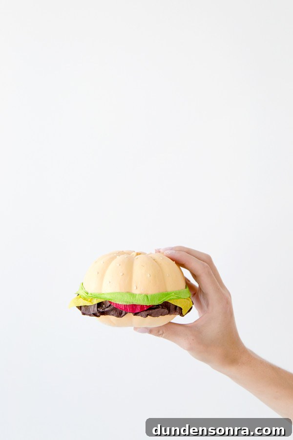 Someone holding a fake burger