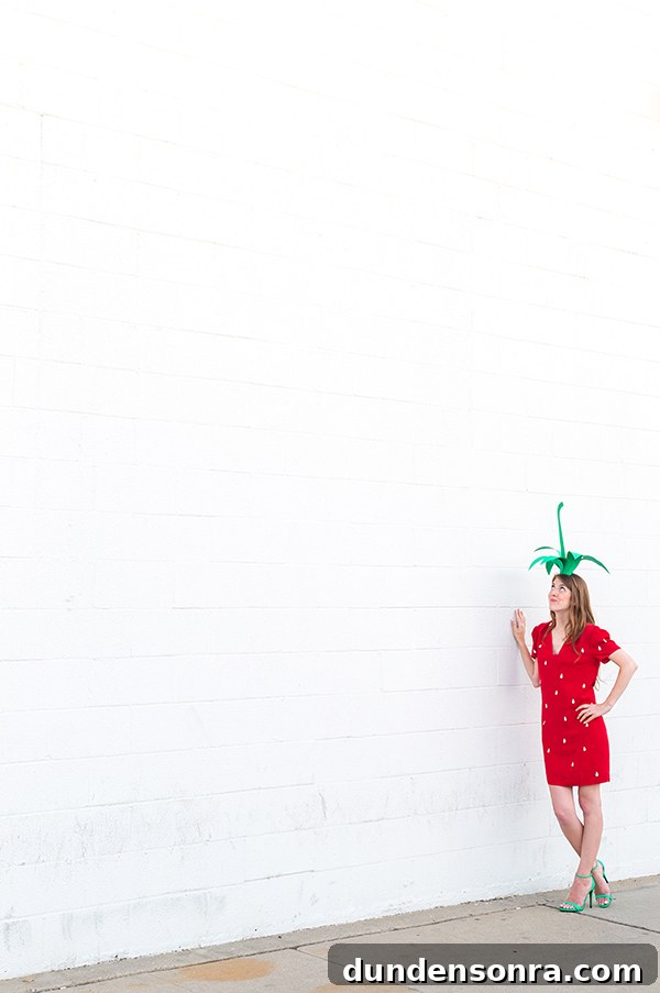 A woman in a strawberry costume 