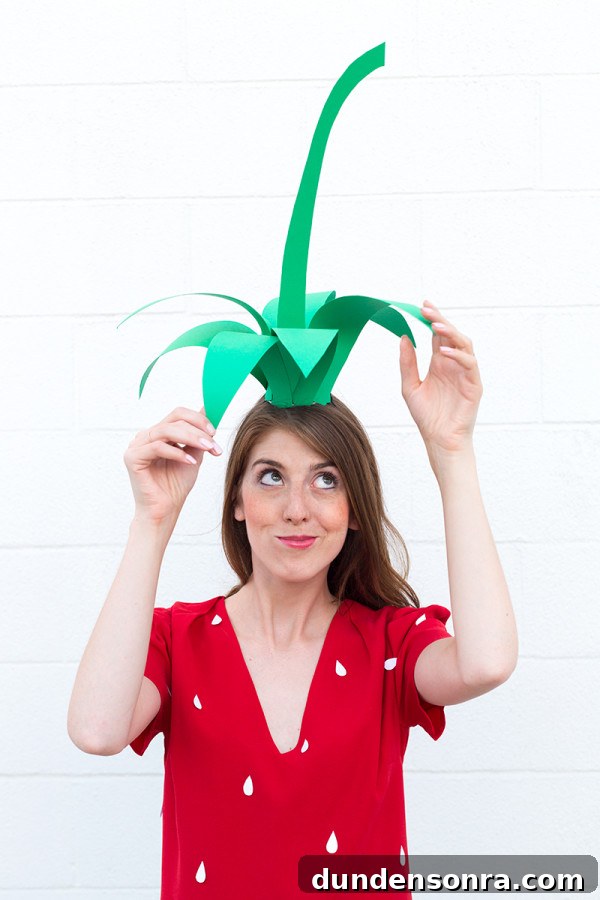 A woman in a strawberry costume 