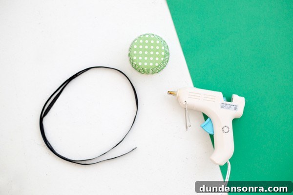 Ribbon, glue, and green paper 
