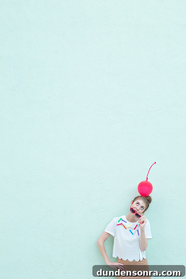A person wearing a cherry hat
