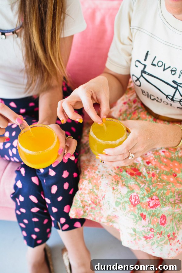 Women drinking an orange drink