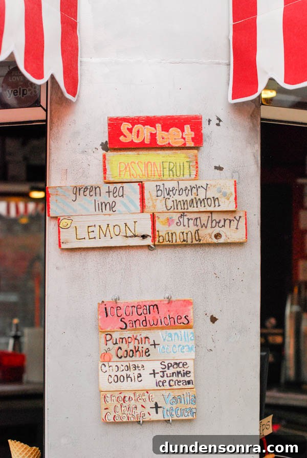 Wooden signs with ice cream flavors on it