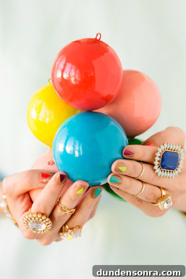 Someone holding colorful glass balls