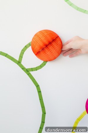 Washi Tape Cactus Wall Art Tutorial: Step-by-Step DIY Decor Guide 9 Orange paper ball and green tape