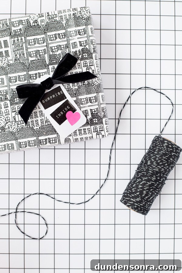 Creative Holiday Gift Wrapping Ideas to Impress Loved Ones 6 A gift with a bow and card