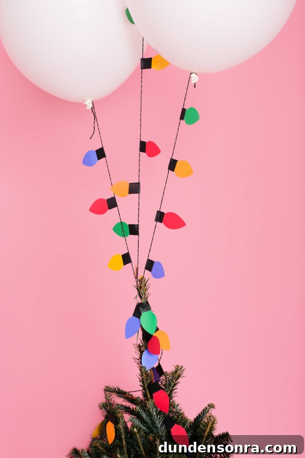 Paper Christmas lights on a tree