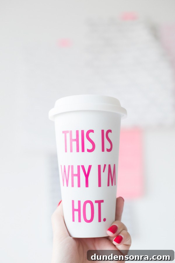 Why I Heat My Own Travel Mugs: DIY Insulated Tumbler Guide 99 A paper mug with pink words
