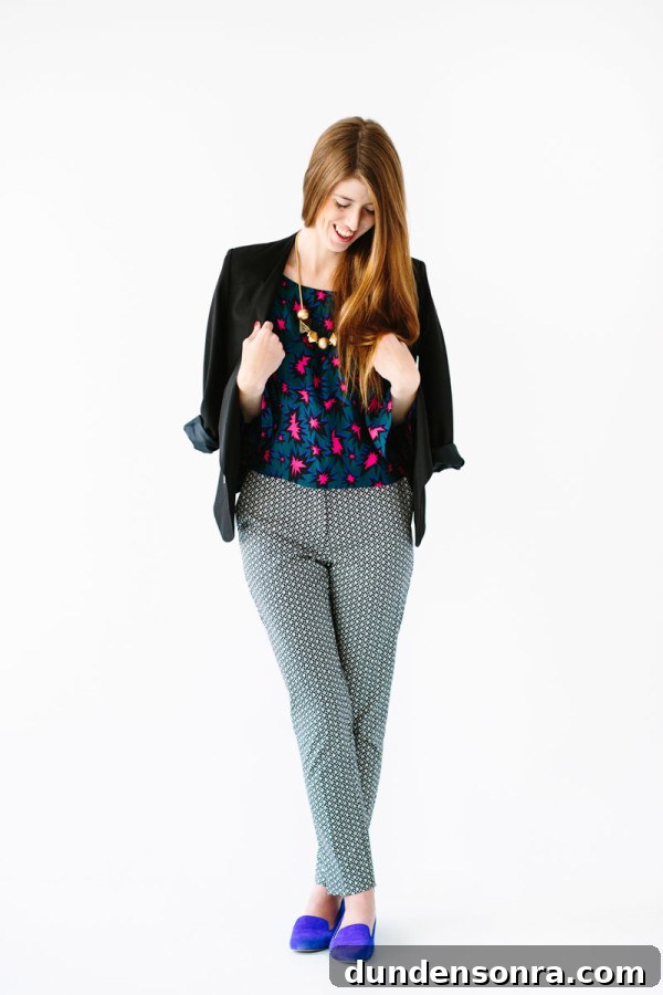 A woman wearing pants and a blazer