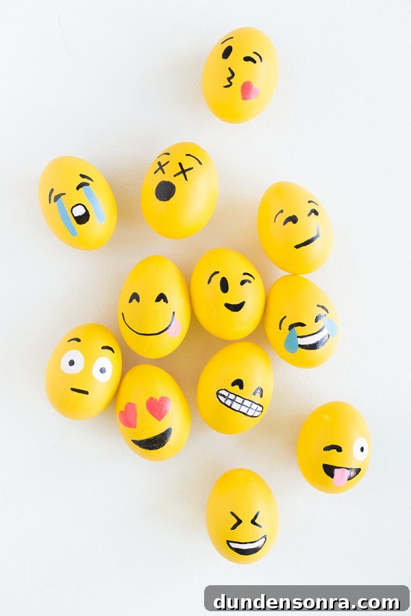 Eggs with painted emojis on it