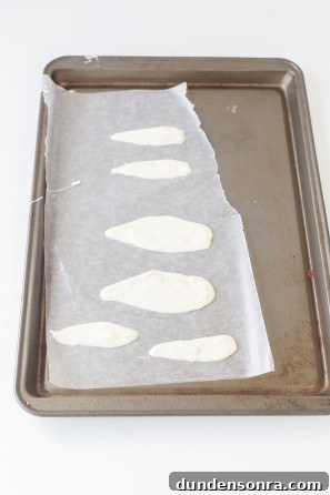 White frosting on a tray