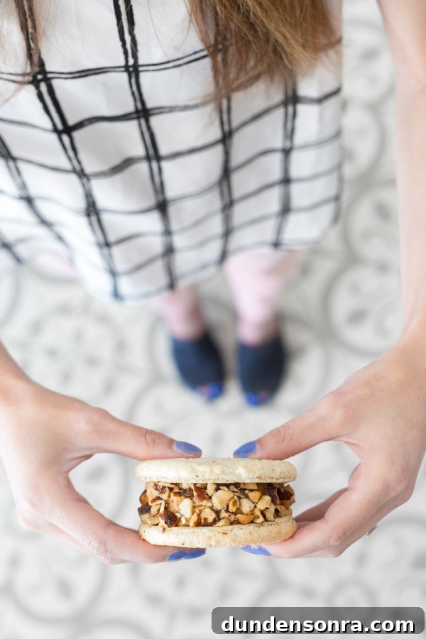 Sugar Fix: Inside Jeni’s Splendid Ice Creams Story 13 Someone holding an ice cream sandwich