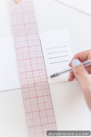 Creative DIY Postcard Message Ideas with Patterned Designs 8 Someone drawing lines on a paper