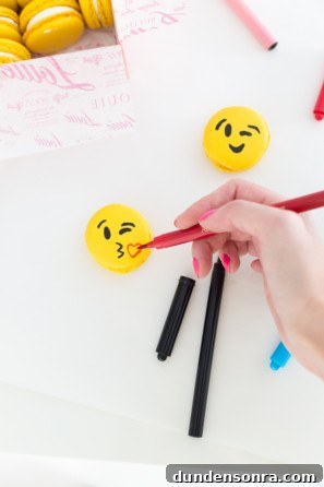 Emoji macaron and pens