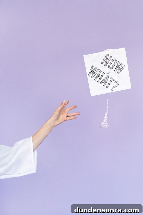 Someone throwing a graduation cap in the air