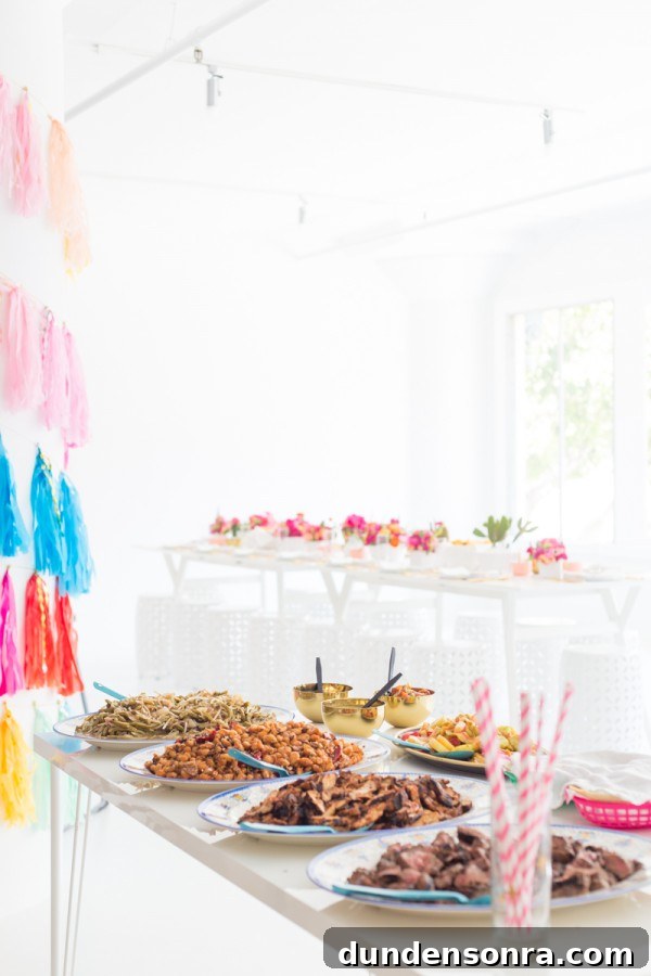 Tables with flowers and snacks