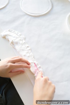 Someone molding clay