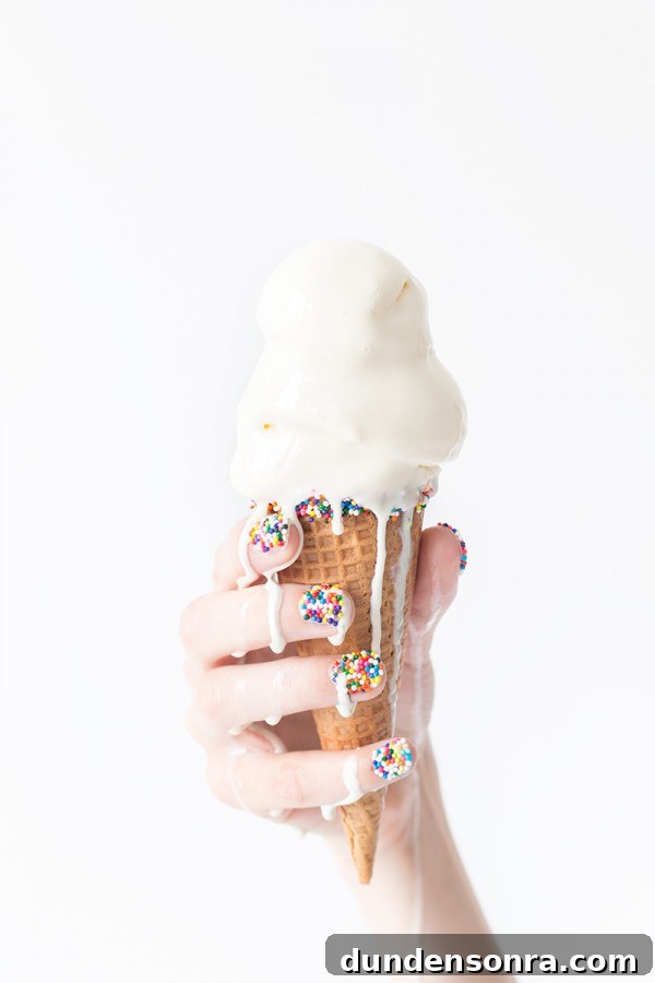 Someone holding melting ice cream