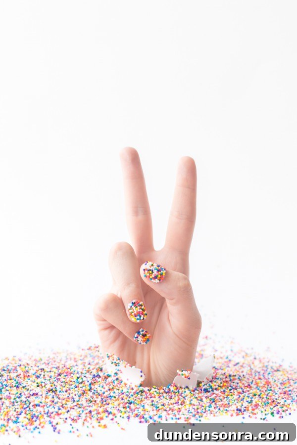 Nails with sprinkles on them