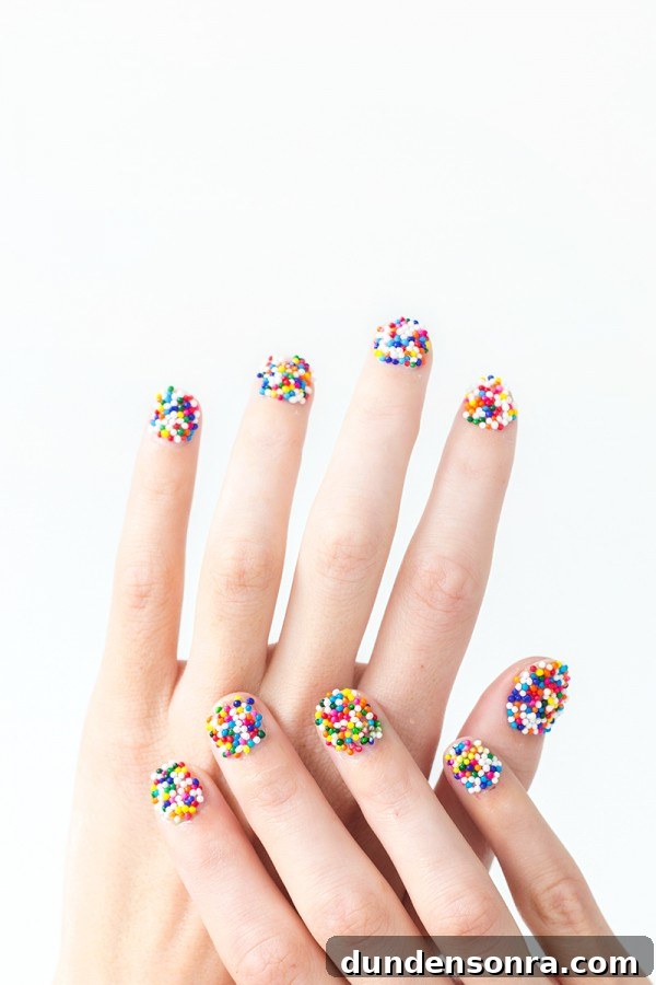 Nails with sprinkles on them