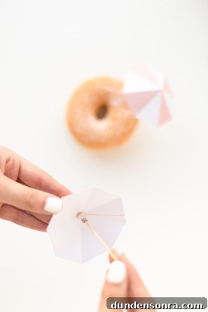 A donut with a little umbrella
