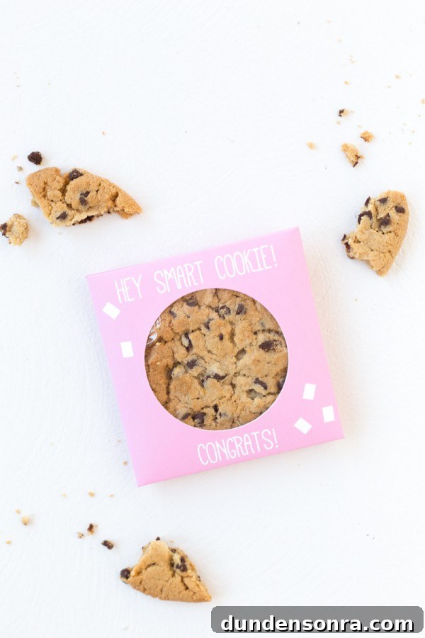 A cookie in a pink box