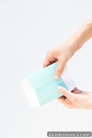Someone folding a box