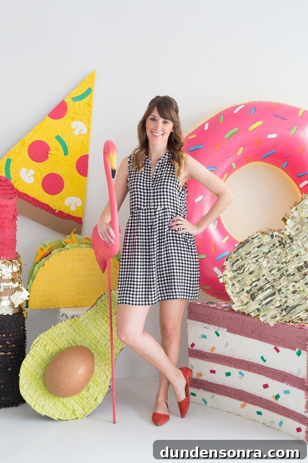 A woman standing next to a bunch of pool floaties
