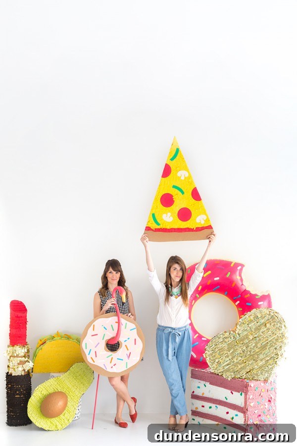 Someone holding a pizza in the air