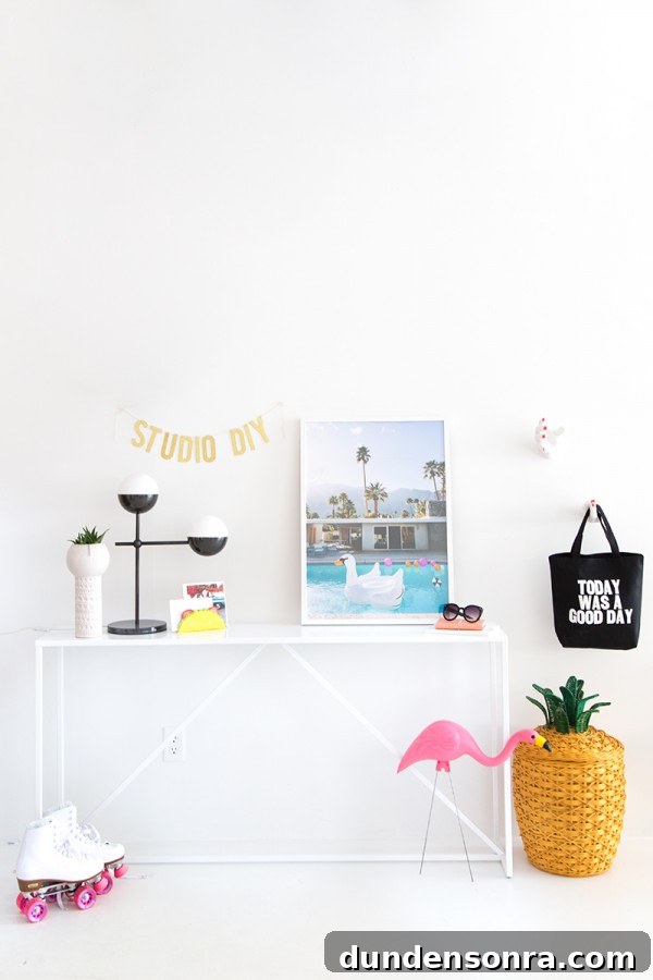 A desk with photos and bags on it