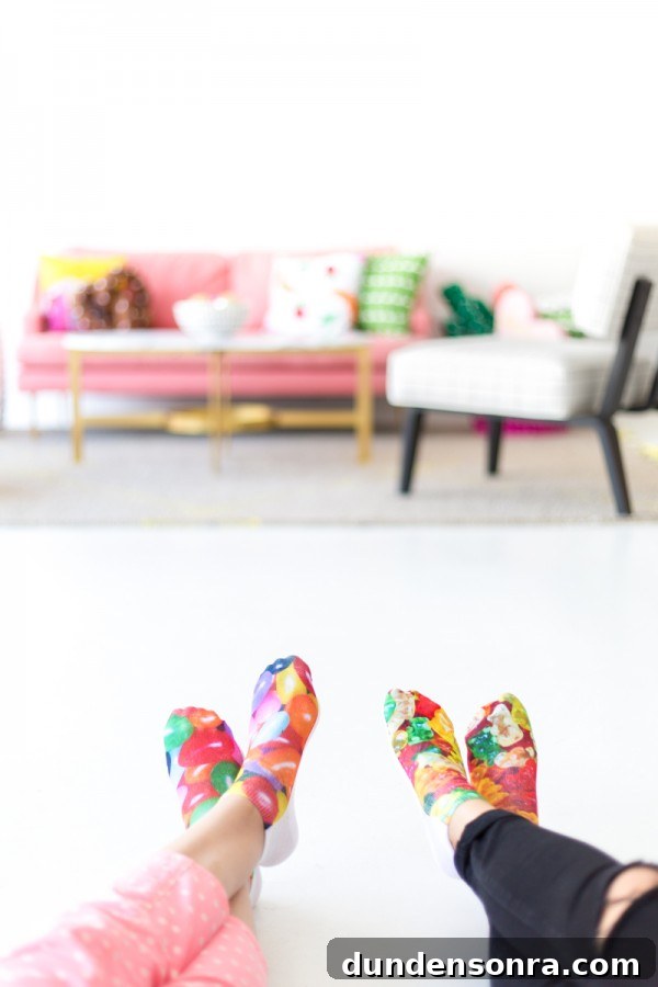 People with socks and a living room in the background
