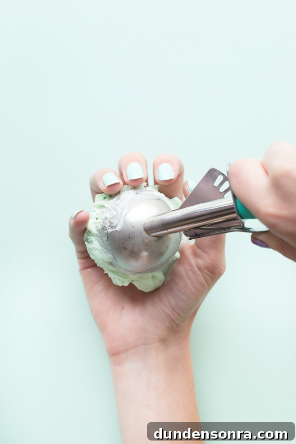 Someone scooping ice cream