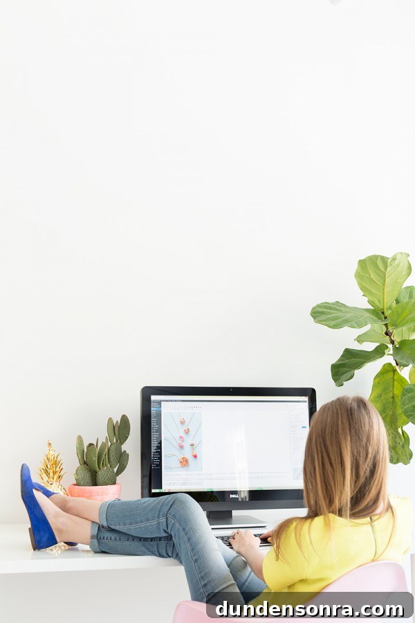 Someone sitting in front of a computer