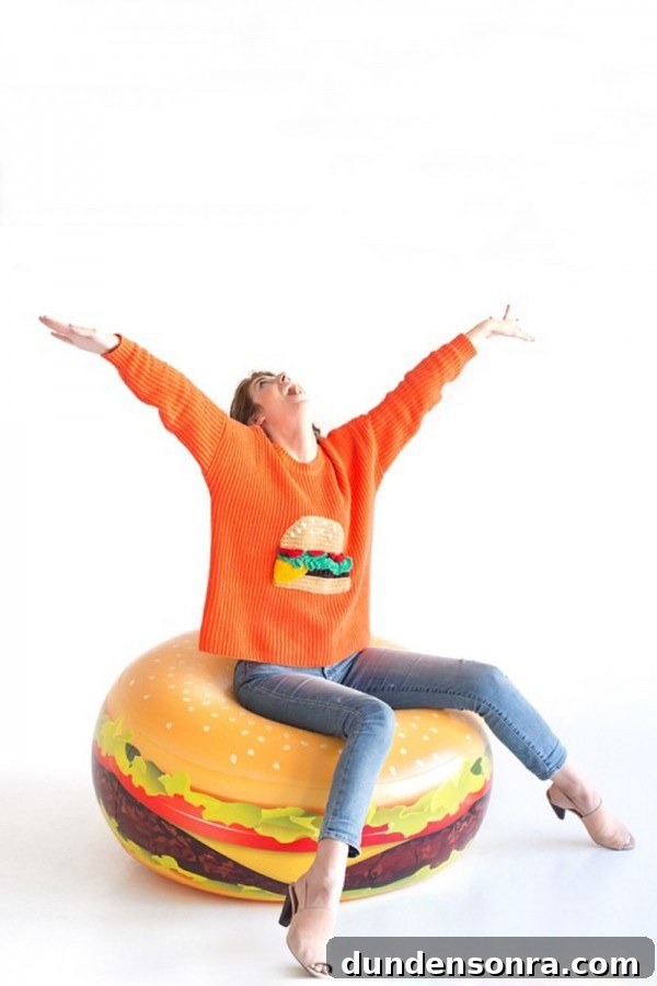 A woman sitting on a burger float