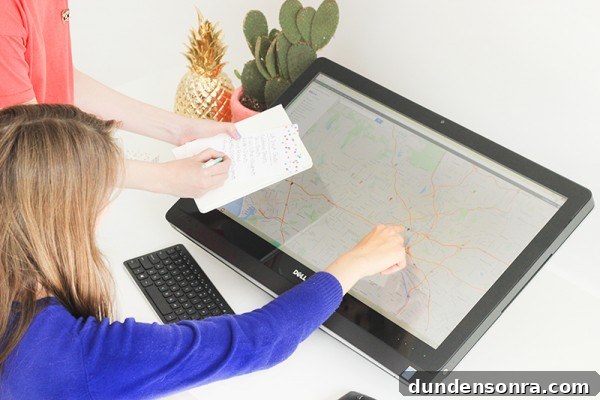 A woman touching a digital map