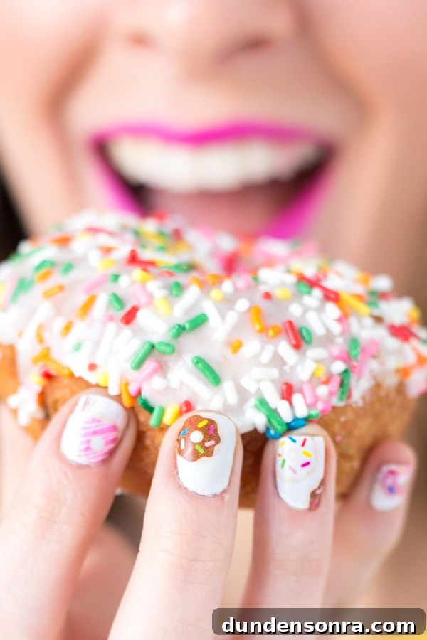 Someone holding a donut
