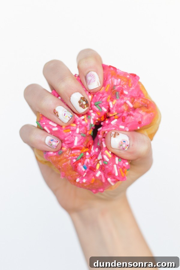 Someone holding a donut