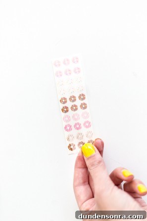Someone holding donut stickers
