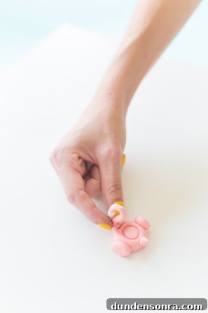 Someone holding clay
